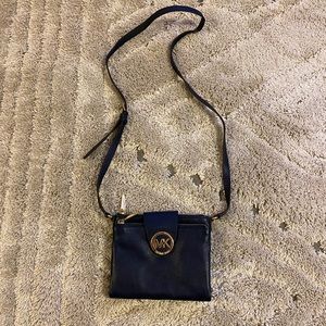 NEVER USED Michael Kors cross-body navy purse.